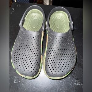 Two pairs of size 4 youth crocs.